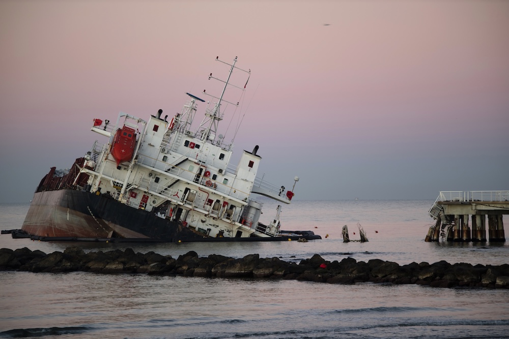 Modern day ship sinking at the marina