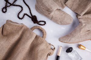 Slow fashion clothing spread out on a table
