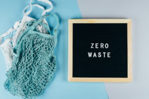 Zero waste sign with reusable cotton mesh bags