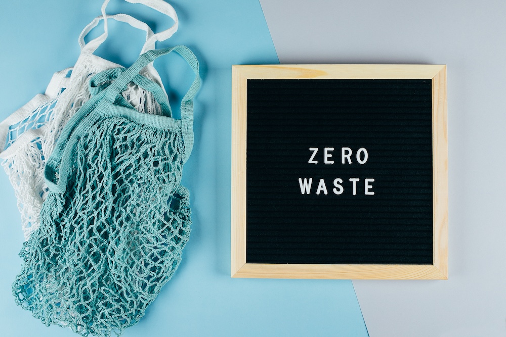 Zero waste sign with reusable cotton mesh bags