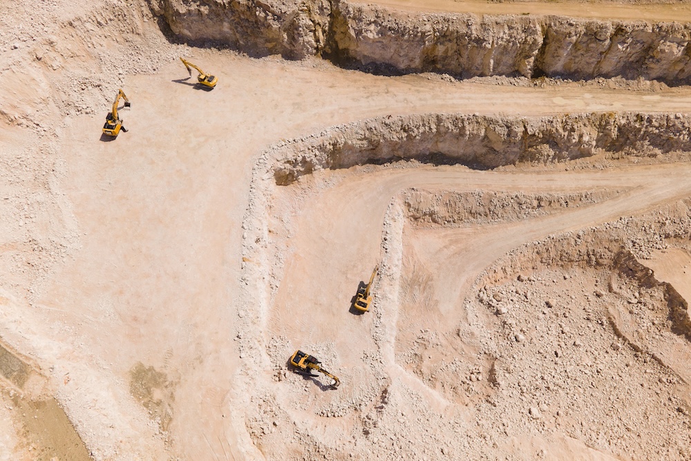 Drone flying over an active mine
