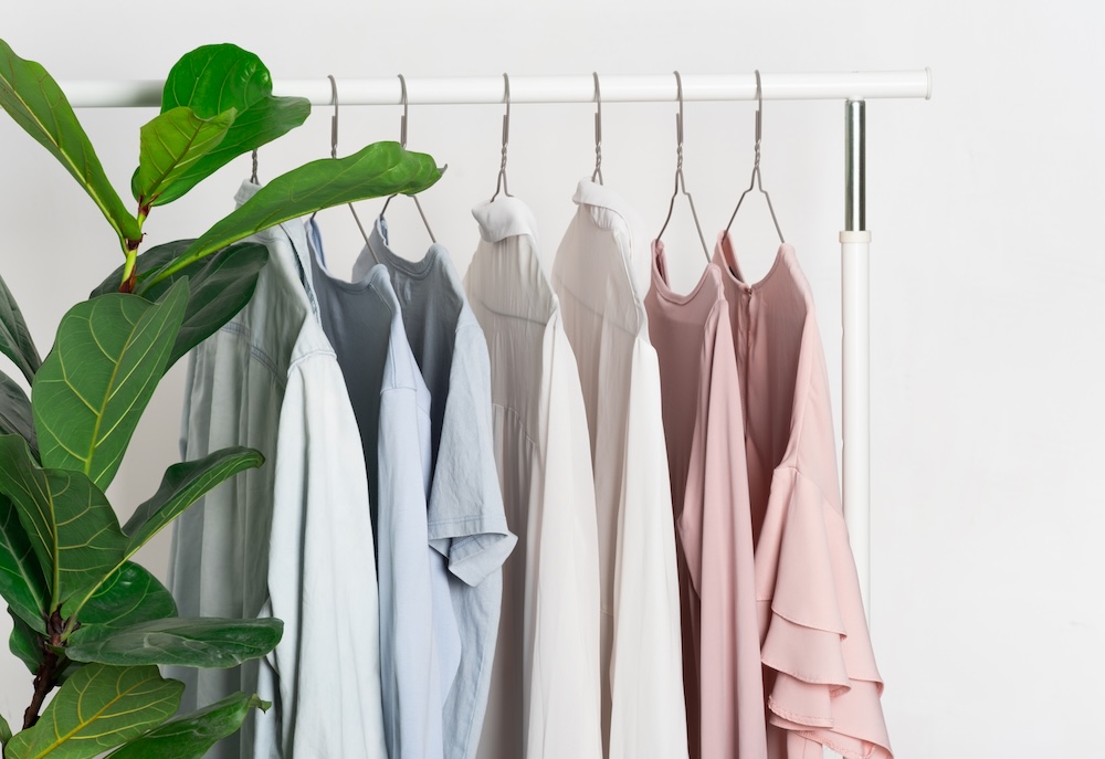 minimal looking clothing hanging on a clothing rack