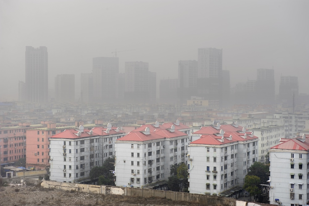 Air pollution over apartments in a town