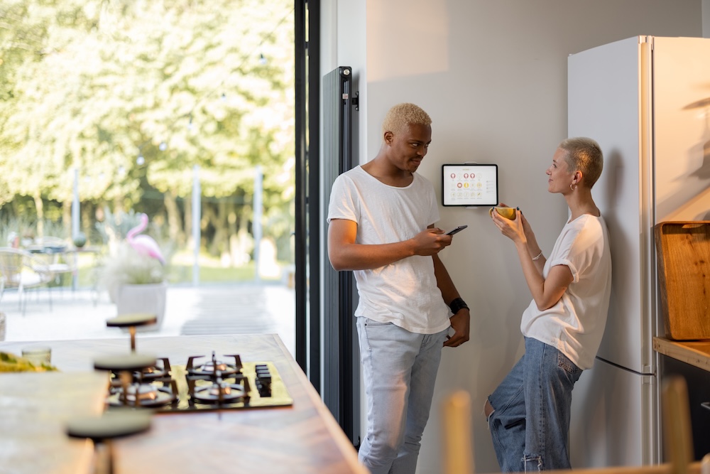 Couple configuring a smart home panel