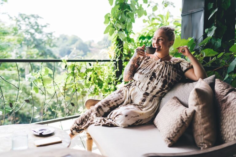Woman sitting in luxury surrounded by nature