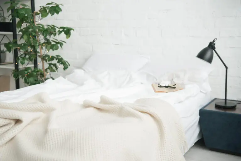 bamboo sheets on an unmade bed
