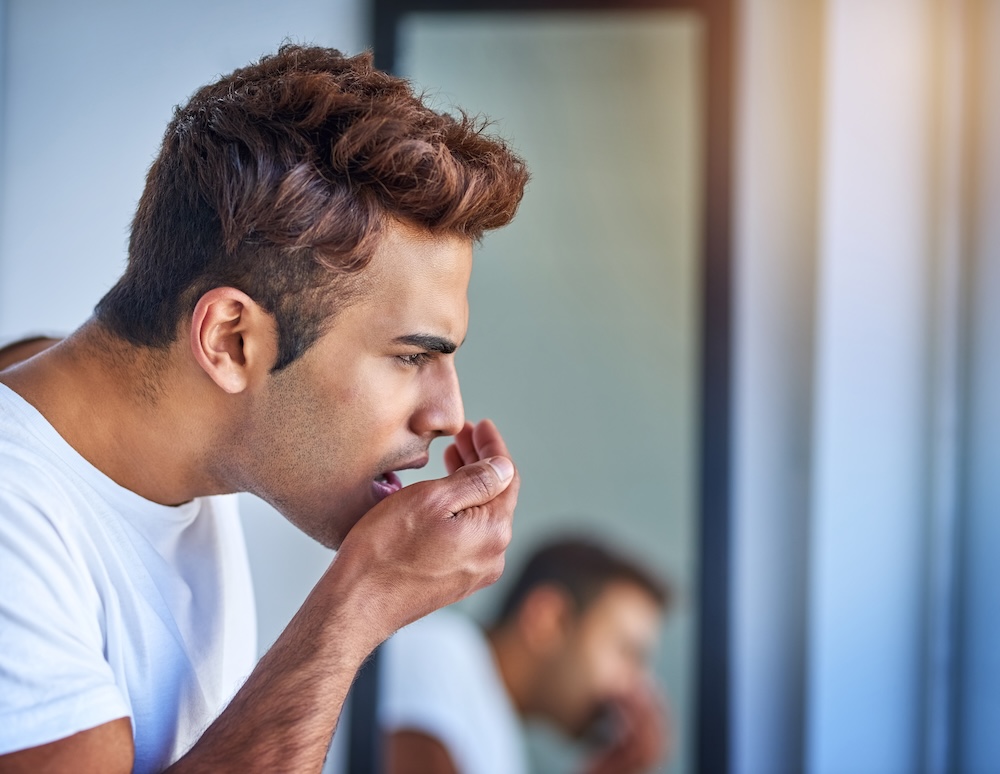 bad checking his bad breath