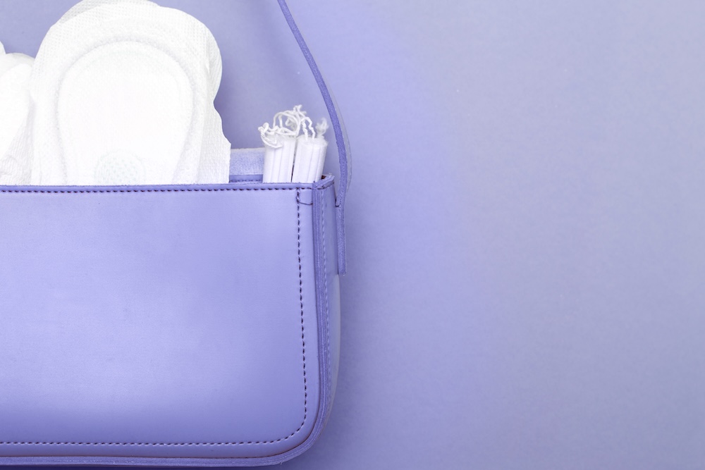 period hygiene products in a purse