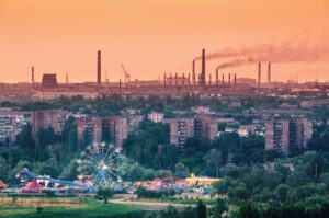 amusement park with a air pollution in the background