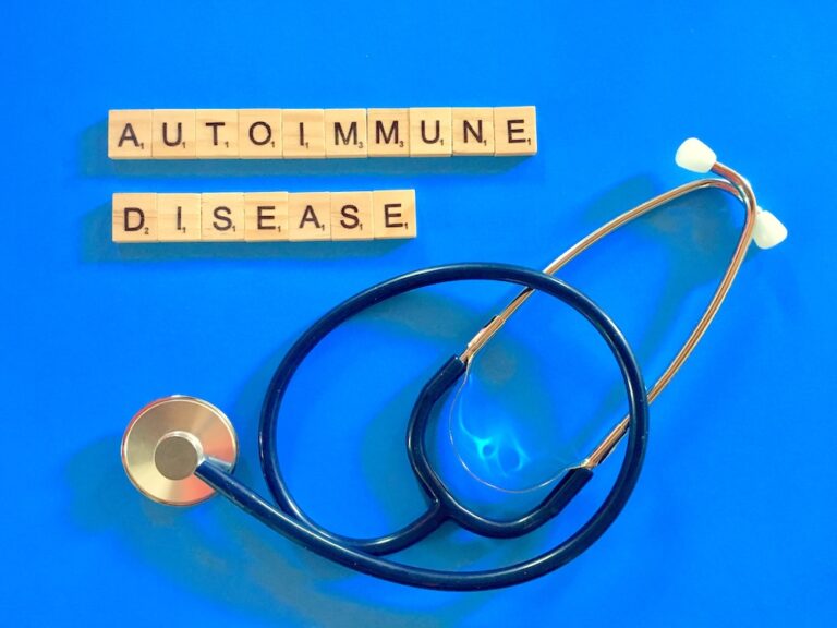 blocks with letters spelling out auto immune diseases with stethoscope
