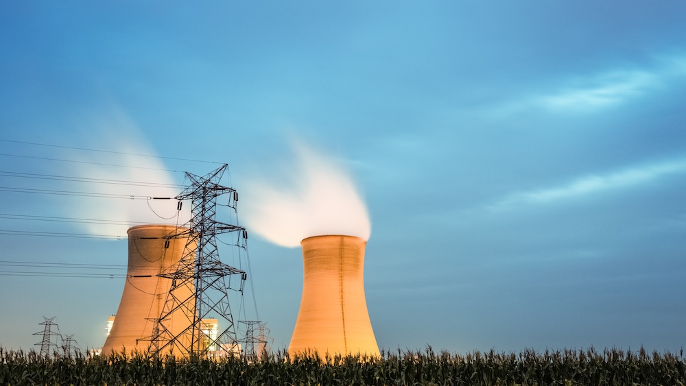 nuclear power plant cooling tower at night