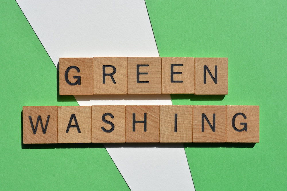 wooden blocks spelling out greenwashing