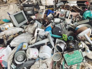 pile of electronics at an e-waste center