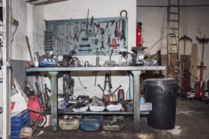 messy garage with lots of tools and clutter