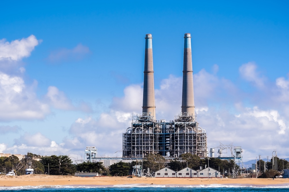 power plant against a blue sky