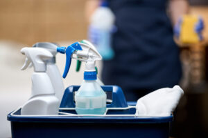 close up of cleaners in a carrying bucket