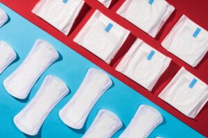 period pads in plastic and period liners flat