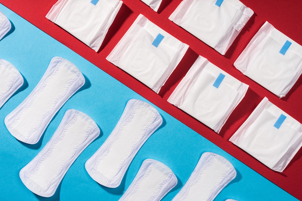 period pads in plastic and period liners flat