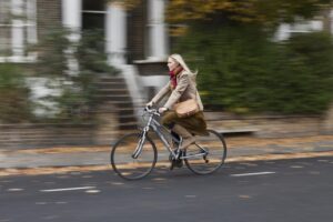 woman cycling to work on a bike
