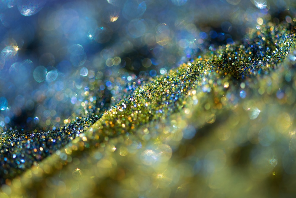 Blue and gold glitter floating