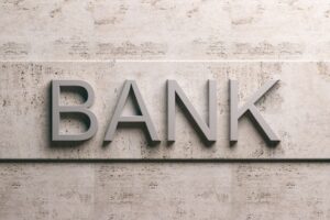 words spelling bank on marble stone wall
