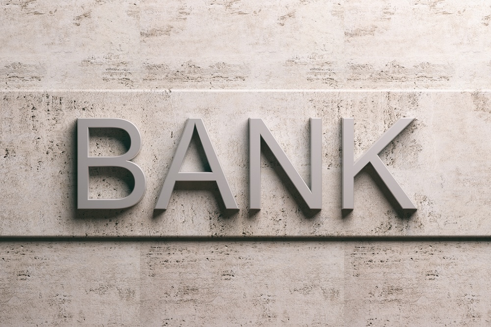 words spelling bank on marble stone wall
