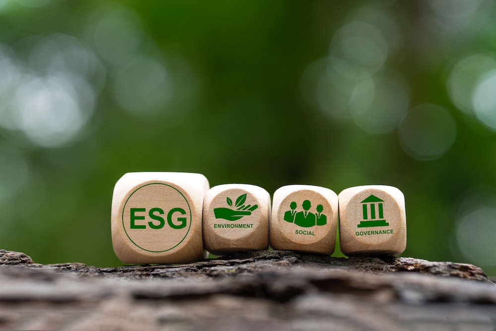 ESG with explanations spelled out on wooden cubes