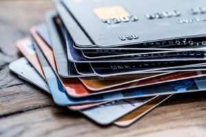 stack of plastic credit cards on a table