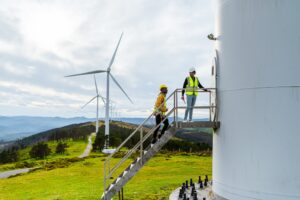 Wind power and engineers operating wind turbine
