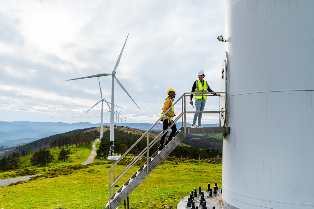 Wind power and engineers operating wind turbine