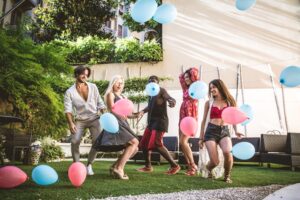 Friends having a party with balloons
