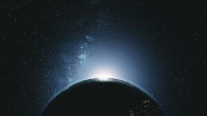 earth orbit with sunlight glowing above