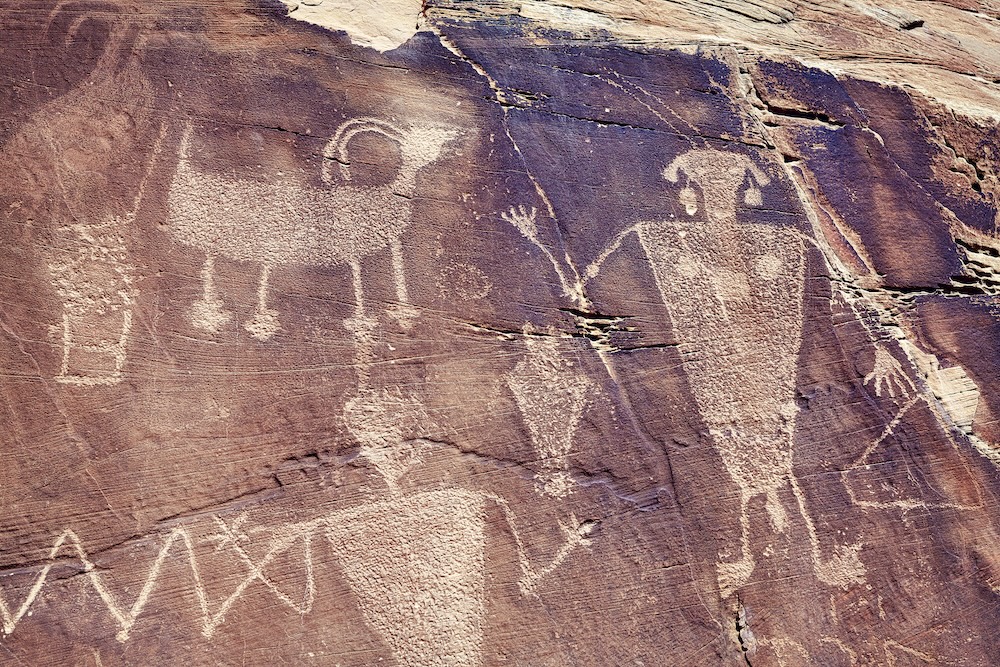 petroglyphs on rock in a cave