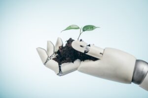Artificial intelligent hand with soil and a seedling