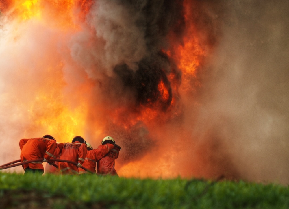 firefighters putting out a megafire