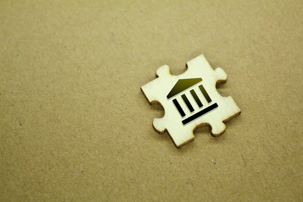bank icon on a puzzle piece