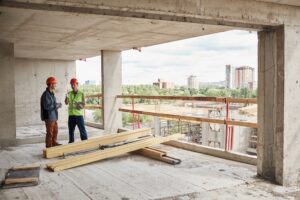 construction workers designing next steps for project