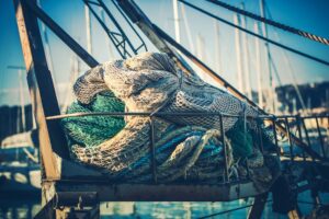 Fisherman fishing nets drying on boat