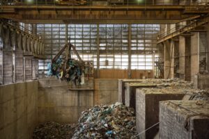 Waste processing plant with decaying garbage