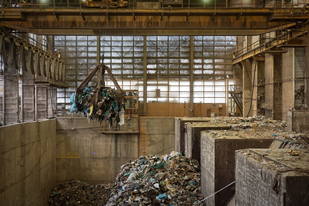 Waste processing plant with decaying garbage