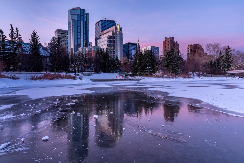 Snowy riverside by a skyline